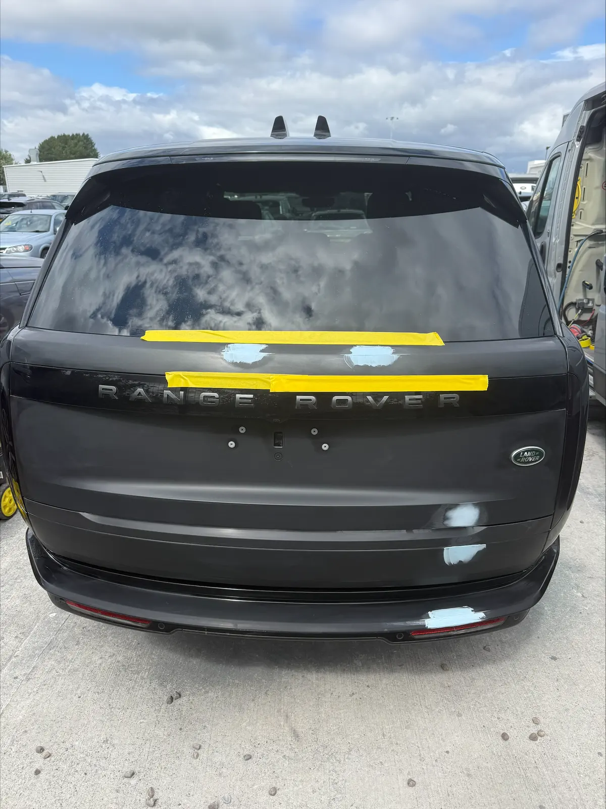 Range Rover rear tailgate before repair